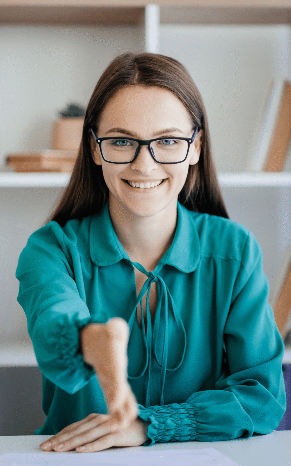 Confident-Woman-At-Interview-Offering-Hand